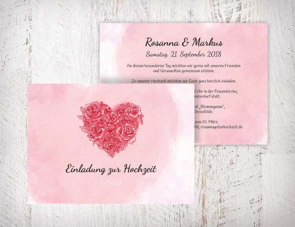 Hochzeitseinladungen Herz aus Rosen – Rosanna | Diese Hochzeitseinladungen mit einem gezeichneten Herz aus roten Rosen auf rosa Aquarell-Hintergrund bekommst du nur hier. Einfach im Designertool selber fertig gestalten | Mustertext mit Schrift und Farbe sind veränderbar | starhochzeit.de